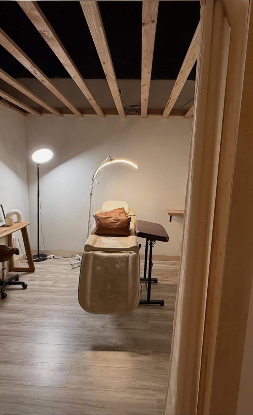 Artist preparing tools for a fine-line tattoo